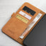 Card and note storage in the Tan Leather Folio Case (MagSafe) for iPhone 14 Plus