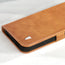 Close up of the Tan Leather Folio Case (MagSafe) for iPhone 14 Plus
