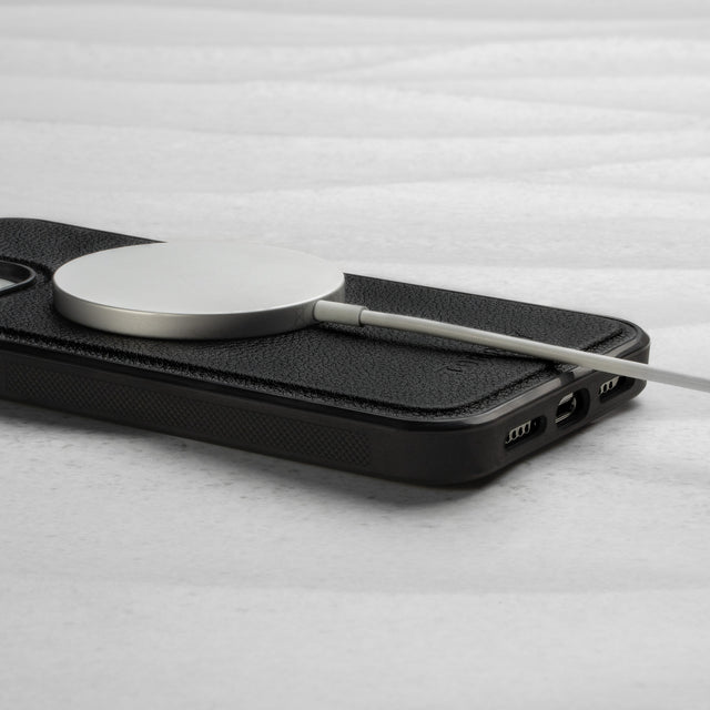 MagSafe charger attached to the Black Leather Bumper Case (with detachable cover) for iPhone 14 Pro