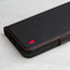 Close up of the Black (with Red Stitching) Leather Folio Case (MagSafe) for iPhone 14 Pro