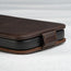 Magnetic closure tabs on the Dark Brown Leather Flip Case for iPhone 14 Pro Max