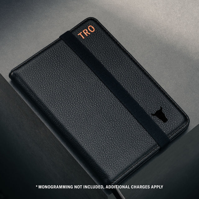 Close up of the TORRO bulls head logo on the Black Leather Passport holder