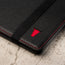 Close up of the TORRO bulls's head logo on the Black Leather (with Red Stitching) Passport Holder