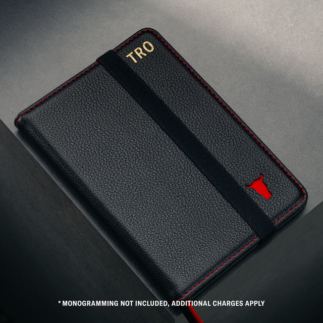 Close up of the TORRO bulls's head logo on the Black Leather (with Red Stitching) Passport Holder