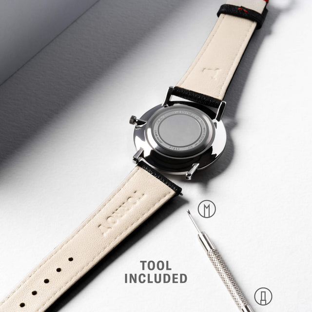 Highlighting the dual function tool (included) to easily swap the Luxury Black with Red Stitching Leather Watch Strap