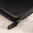 Close up of the Black Leather Solo Travel Wallet